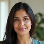Dr. Maya Patel, Cognitive Behavioral Therapist, smiling